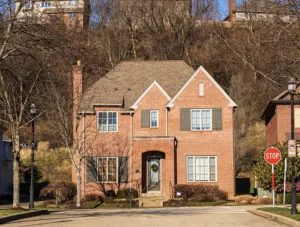 Brown shingle roof repair on house in Pittsburgh - Tri Link