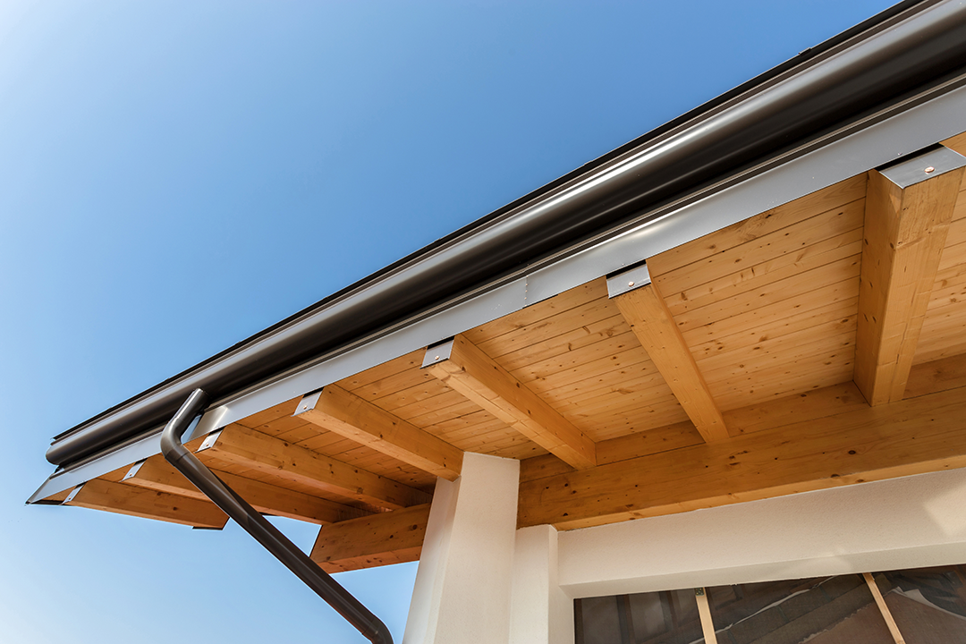 Wood soffit and fascia with a gutter