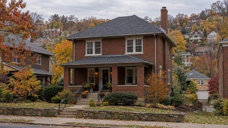 Composition roof with architectural shingles on a brick Pittsburgh home